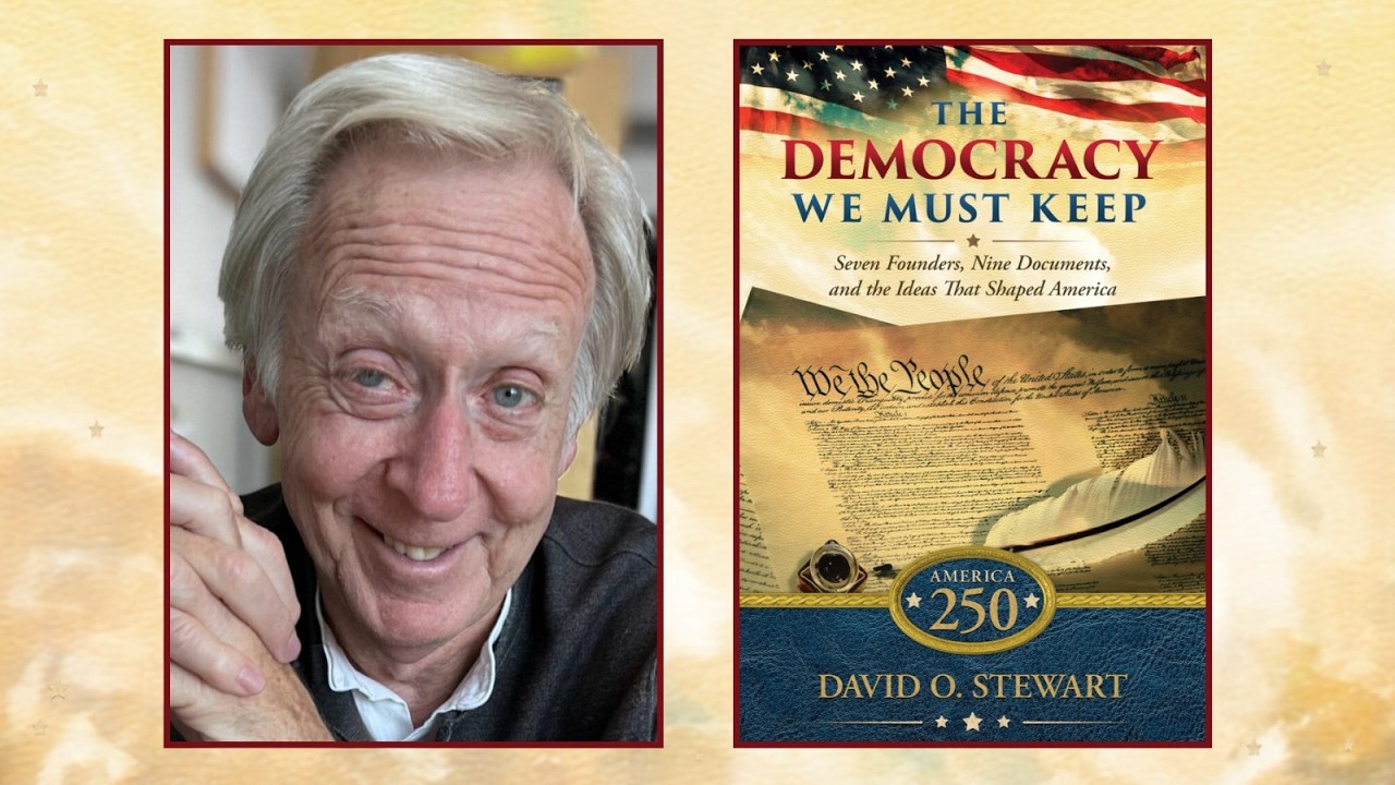 author David O Stewart with the cover of his book The Democracy We Must Keep